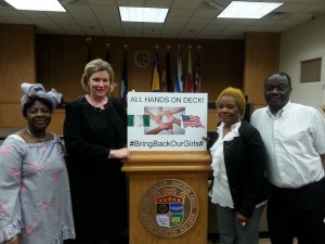 Members of the Nigerian community stand with Mayor Nan Whaley for the #BringBackOurGrils# campaign.